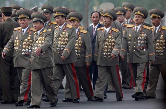 North Korean senior military officials arrive for the opening ceremony of the Cemetery of Fallen Fighters of the KPA in Pyongyang